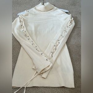 Beautiful Guess lace up sleeve sweater. Like new medium